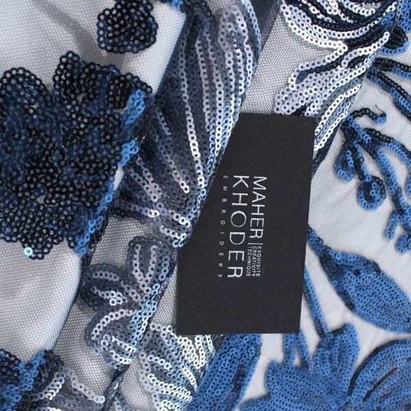 Navy and silver tulle fabric adorned with floral embroidery