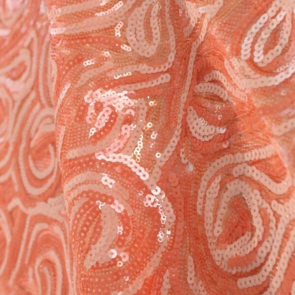 Coral Tulle fabric with round sequins for a sparkling, elegant touch