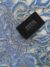 Blue Tulle fabric adorned with enormous and tiny floral embroidery