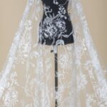 Off White Tulle adorned with floral emroidery