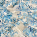 Vibrant baby blue tulle fabric adorned with intricate floral embroidery