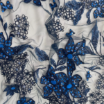 blue tulle fabric with floral embroidery and subtle sequins