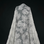 Off White Tulle with large embroidered flowers for a dramatic, eye-catching gown