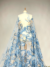 Blue tulle with large, flowy embroidered flowers