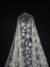 off white tulle with sequined floral details