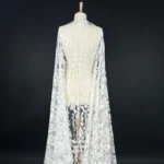 Off white tulle with beautiful and tiny floral embroidery