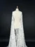 Off white tulle with beautiful and tiny floral embroidery